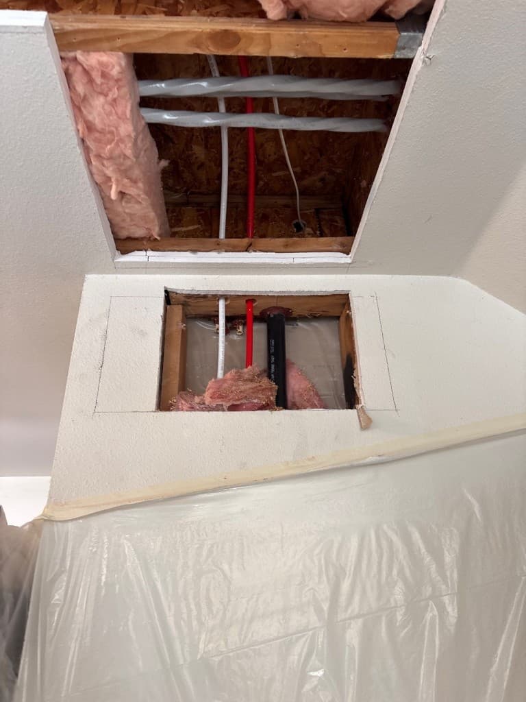 Ceiling and wall access openings with new piping during galvanized repipe replacement project